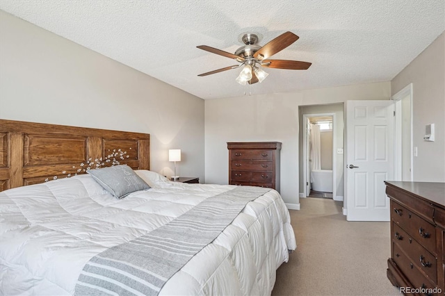 bedroom with baseboards, a textured ceiling, light colored carpet, and ceiling fan