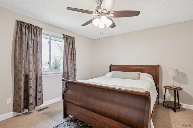 bedroom with carpet flooring, baseboards, and visible vents