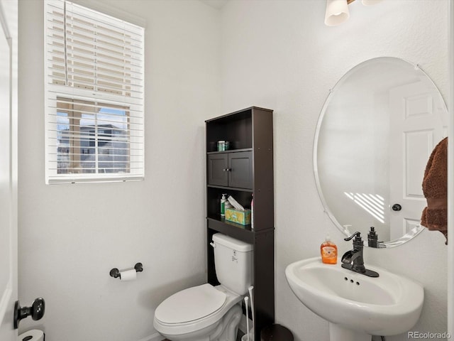 21901 E 42nd Pl, Aurora, CO 80019 - half bathroom with a sink and toilet