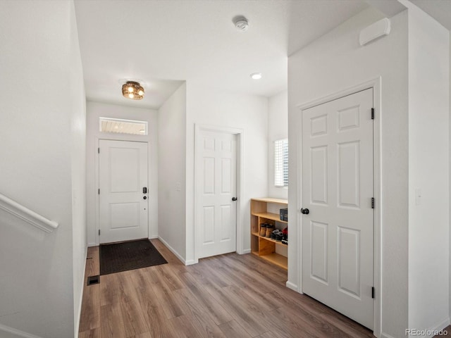 21901 E 42nd Pl, Aurora, CO 80019 - entrance foyer featuring wood finished floors, baseboards, and recessed lighting