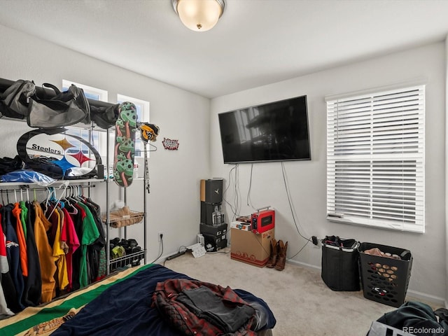 21901 E 42nd Pl, Aurora, CO 80019 - carpeted bedroom featuring baseboards