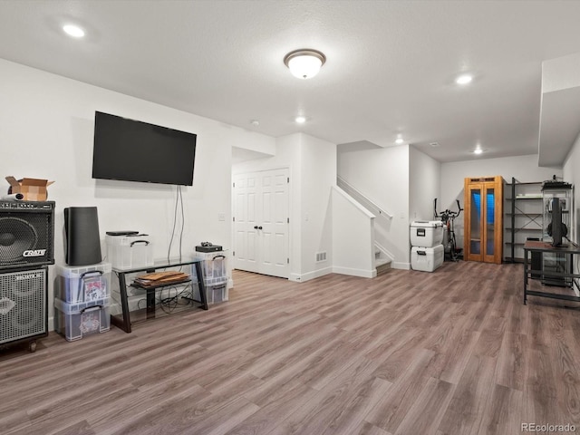 21901 E 42nd Pl, Aurora, CO 80019 - playroom with wood finished floors, recessed lighting, and baseboards