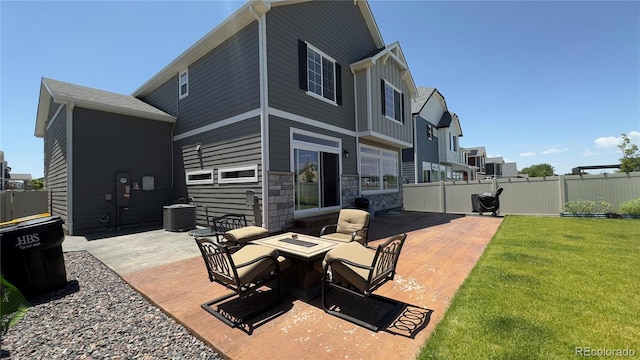 21901 E 42nd Pl, Aurora, CO 80019 - view of patio / terrace featuring an outdoor fire pit