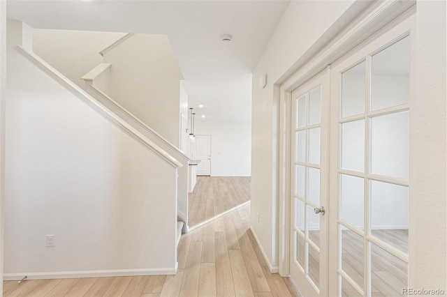 stairway with wood-type flooring