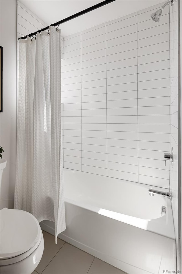 full bath featuring shower / tub combo with curtain, toilet, and tile patterned floors