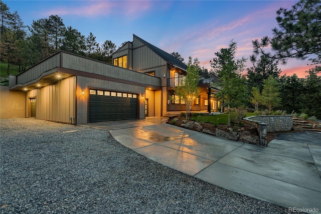 1298 Meadow View Dr, Evergreen, CO 80439 - modern home with driveway, a garage, and a balcony