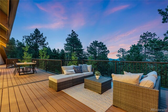 1298 Meadow View Dr, Evergreen, CO 80439 - wooden deck with outdoor lounge area and outdoor dining area