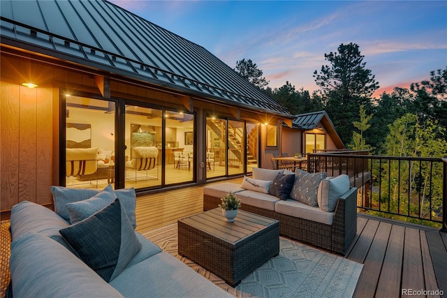 1298 Meadow View Dr, Evergreen, CO 80439 - deck at dusk featuring outdoor lounge area
