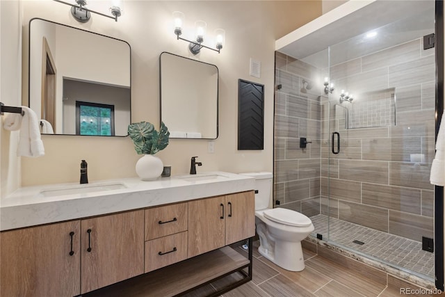 1298 Meadow View Dr, Evergreen, CO 80439 - bathroom featuring double vanity and a shower stall