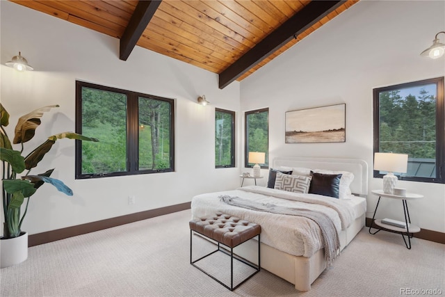 1298 Meadow View Dr, Evergreen, CO 80439 - bedroom featuring light carpet, multiple windows, and wood ceiling