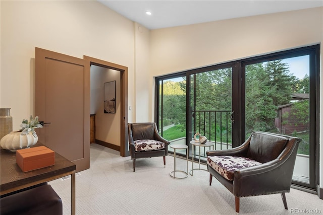 1298 Meadow View Dr, Evergreen, CO 80439 - living area featuring light carpet, a towering ceiling, and recessed lighting