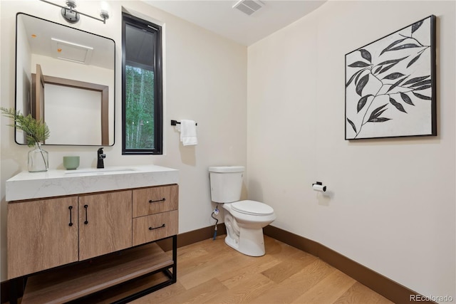 1298 Meadow View Dr, Evergreen, CO 80439 - bathroom with wood finished floors and vanity