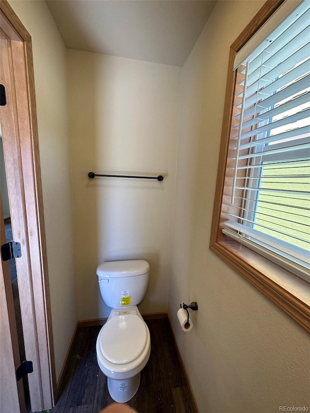 119 Edgewater Cir, Granby, CO 80446 - bathroom with toilet, wood finished floors, and baseboards