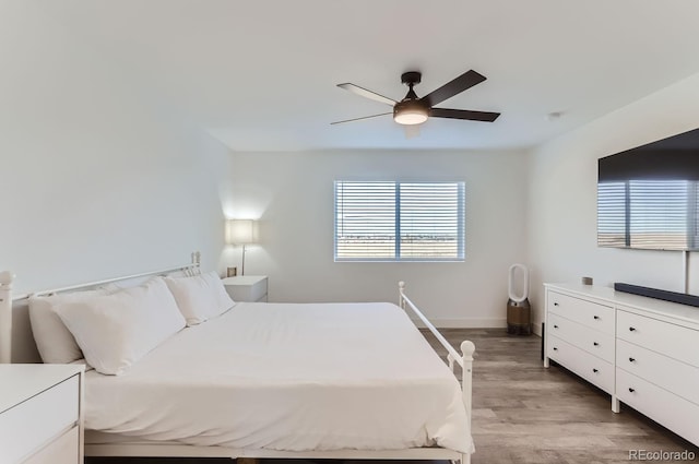 6645 Dry Fork Dr, Frederick, CO 80516 - bedroom with light wood-type flooring, ceiling fan, and baseboards