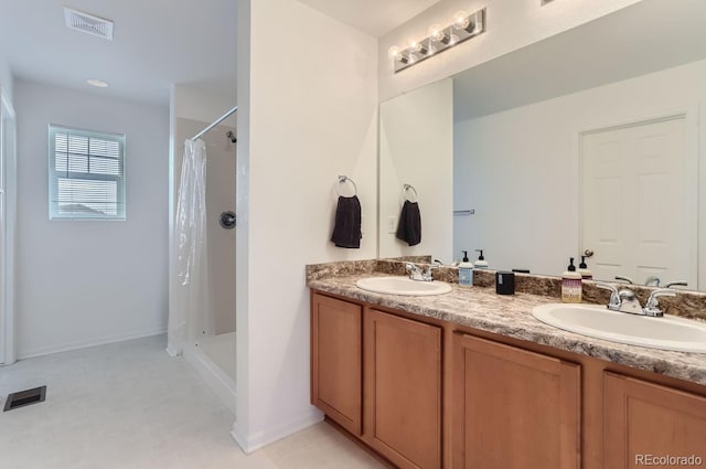 6645 Dry Fork Dr, Frederick, CO 80516 - full bathroom with double vanity and a shower with curtain