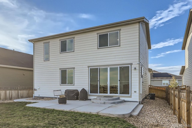 6645 Dry Fork Dr, Frederick, CO 80516 - rear view of property featuring a fenced backyard and a patio