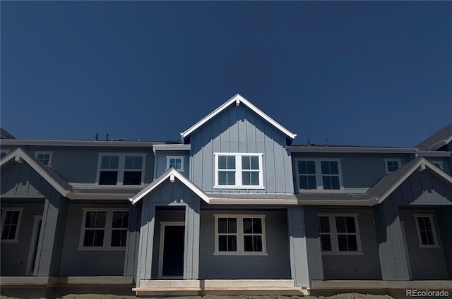 17137 W 91st Ln, Arvada, CO 80007 - view of front facade with board and batten siding