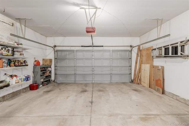 garage featuring a garage door opener