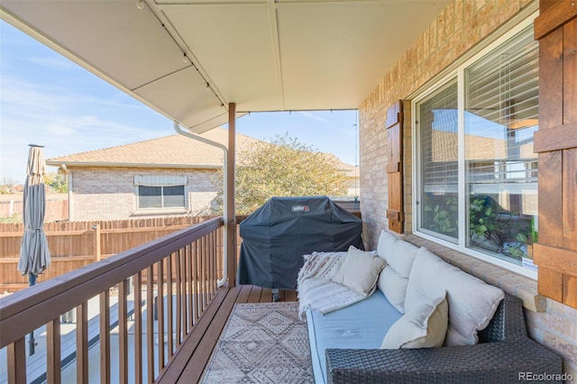 balcony featuring area for grilling