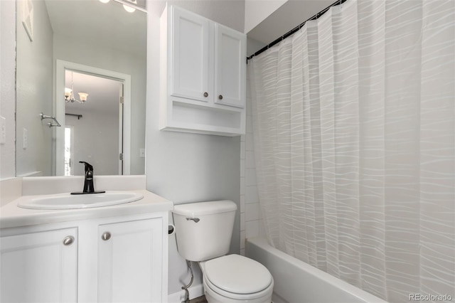 full bathroom with vanity, toilet, and shower / bath combo with shower curtain