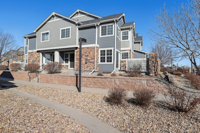 view of front facade with stone siding