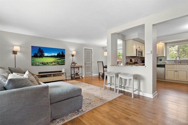 7306 S Dexter St, Centennial, CO 80122 - living area with light wood-style floors