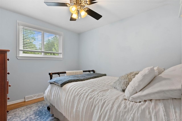7306 S Dexter St, Centennial, CO 80122 - bedroom with wood finished floors and a ceiling fan