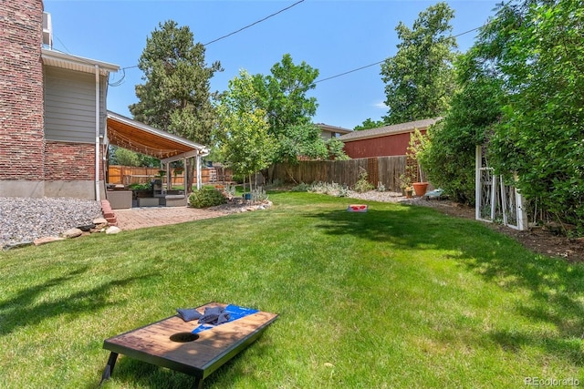 7306 S Dexter St, Centennial, CO 80122 - fenced backyard featuring a patio area