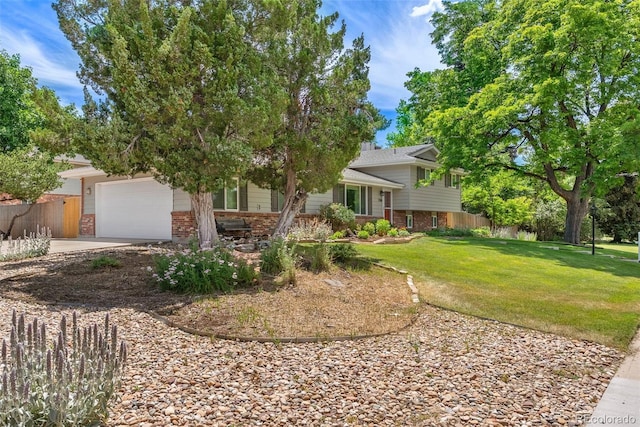 7306 S Dexter St, Centennial, CO 80122 - tri-level home with brick siding, an attached garage, and driveway