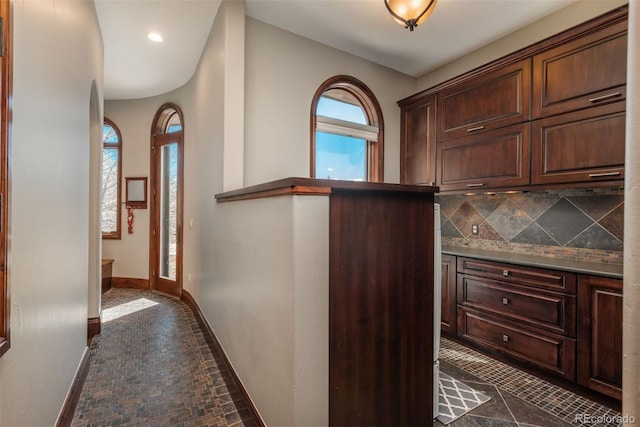 entrance foyer featuring recessed lighting and baseboards