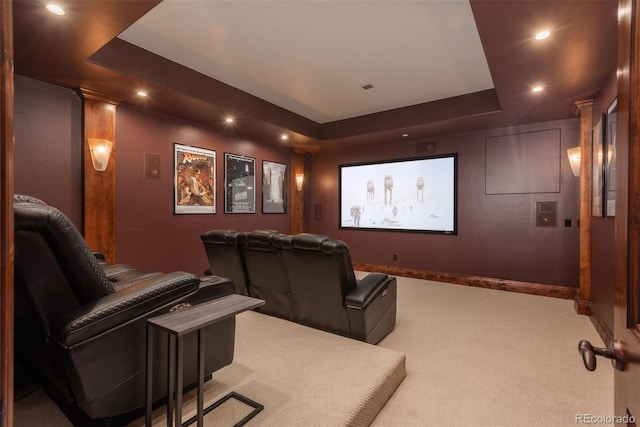 home theater with recessed lighting, a raised ceiling, carpet flooring, and baseboards