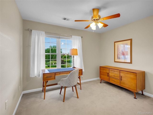 2716 W Greens Dr, Littleton, CO 80123 - office space with baseboards, light carpet, and ceiling fan