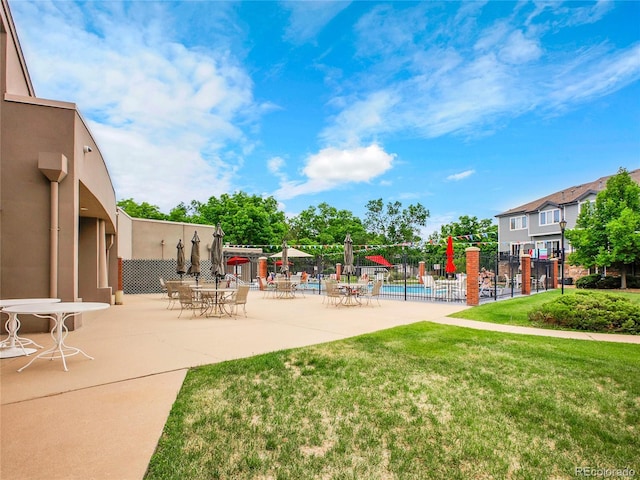 2716 W Greens Dr, Littleton, CO 80123 - view of home's community featuring a pool and a patio