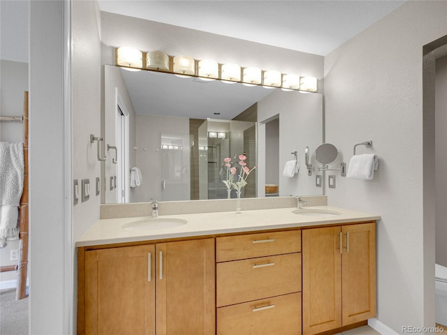 2716 W Greens Dr, Littleton, CO 80123 - full bathroom with double vanity, toilet, and a stall shower