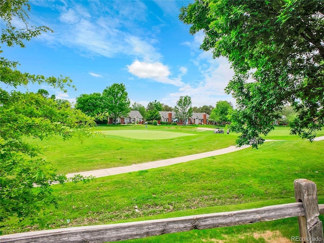2716 W Greens Dr, Littleton, CO 80123 - view of property's community with a yard, an area to practice putting, and golf course view