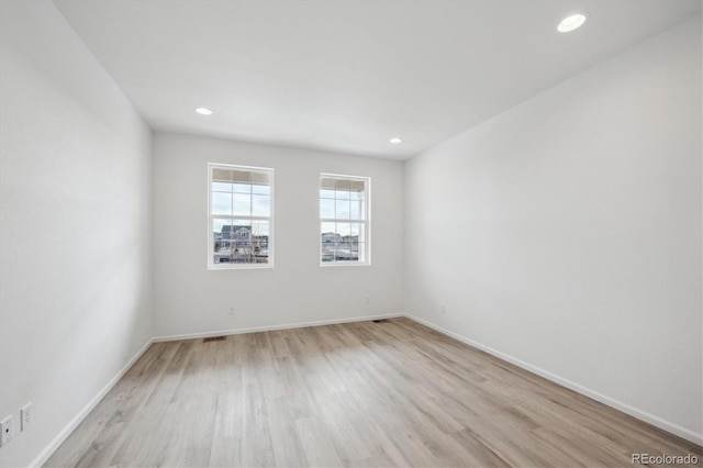 empty room featuring light hardwood / wood-style flooring