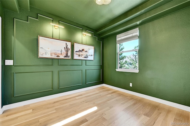 12408 W 83rd Ave, Arvada, CO 80005 - spare room with light wood-style floors and baseboards