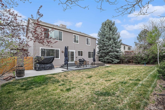 rear view of house with a patio area and entry steps