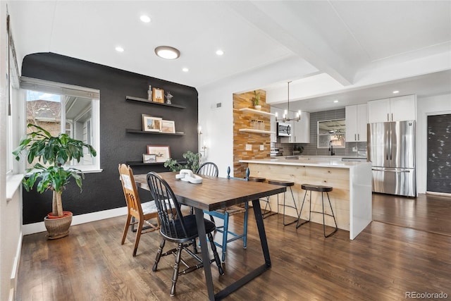 dining area with baseboards, recessed lighting, beamed ceiling, and dark wood finished floors