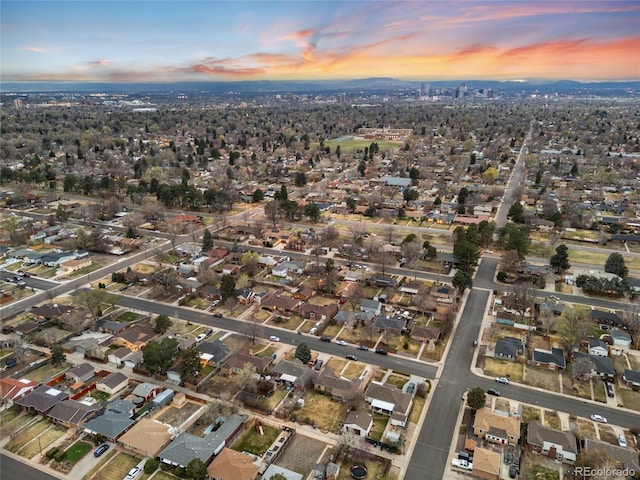aerial view at dusk with a residential view