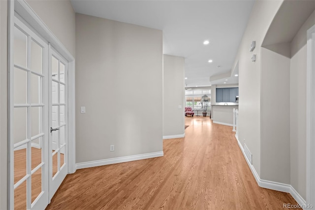 6900 W Grant Ranch Blvd Unit 88, Denver, CO 80123 - corridor featuring light wood-style floors, baseboards, and recessed lighting