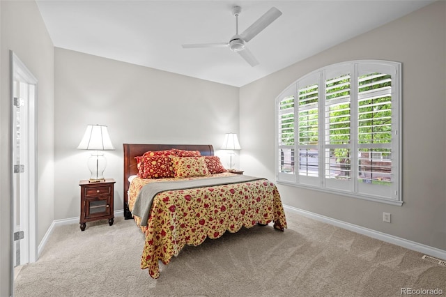 6900 W Grant Ranch Blvd Unit 88, Denver, CO 80123 - carpeted bedroom featuring baseboards and ceiling fan