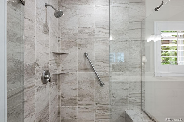 6900 W Grant Ranch Blvd Unit 88, Denver, CO 80123 - full bathroom featuring a tile shower