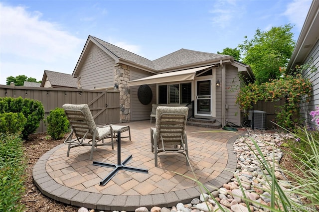 6900 W Grant Ranch Blvd Unit 88, Denver, CO 80123 - fenced backyard featuring a patio area, central air condition unit, and a gate