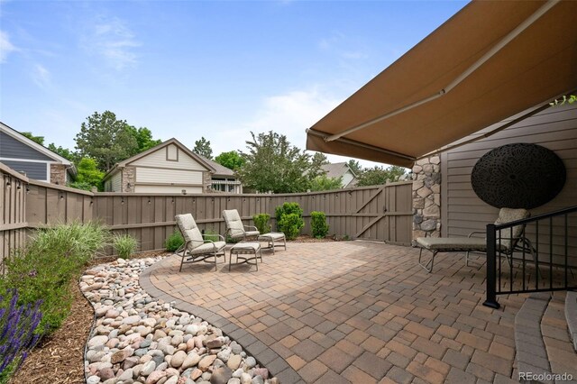 6900 W Grant Ranch Blvd Unit 88, Denver, CO 80123 - view of patio featuring a gate