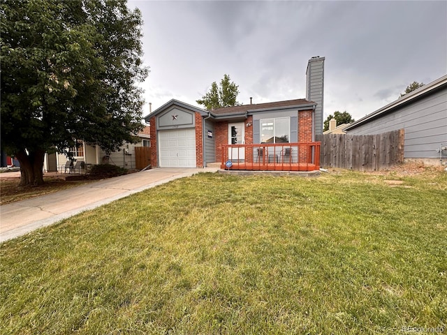 view of front facade with a garage and a front yard