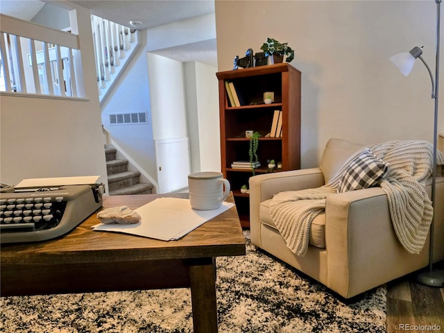 living area featuring hardwood / wood-style flooring