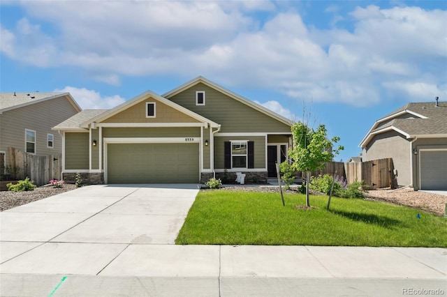 8339 Mosby Way, Colorado Springs, CO 80908 - craftsman inspired home with a garage, stone siding, and driveway