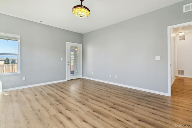 8339 Mosby Way, Colorado Springs, CO 80908 - empty room with wood finished floors and plenty of natural light