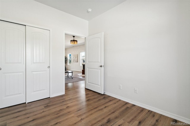 8339 Mosby Way, Colorado Springs, CO 80908 - unfurnished bedroom with wood finished floors and a closet